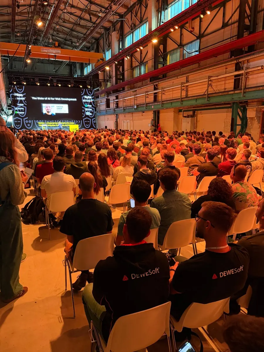 Packed main hall at JSNation 2026 watching Sacha Greif