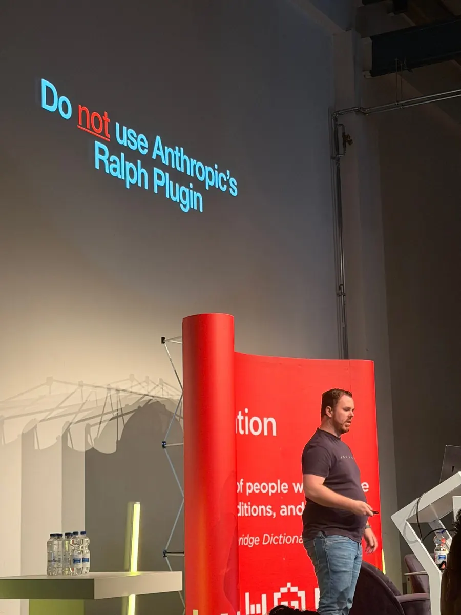 Eddy Vinck on stage with a slide reading Do not use Anthropic's Ralph Plugin